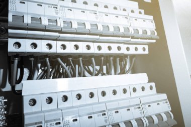 Switchboard equipment. Shield for enterprise electrification. Switchboard for control over electrical equipment. Labeled panel with wires and switches at the enterprise