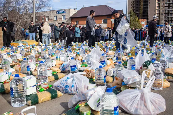 stock image 05 May 2024 Petropavlovsk Kazakhstan, People receiving humanitarian aid packages during an emergency situation under a dangerous situation regime