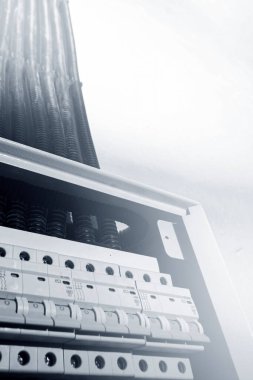 Switchboard equipment. Shield for enterprise electrification. Switchboard for control over electrical equipment. Labeled panel with wires and switches at the enterprise