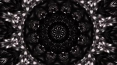 Dairesel desenli siyah beyaz bir nesne. Kaleydoskop VJ döngüsü.