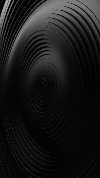 Black background with circular design in the center. Vertical looped animation.