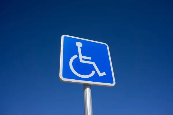 Blue Handicapped Parking Sign Blue Sky Background Room Copy Space Royalty Free Stock Photos