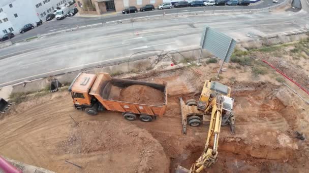 April 2024 Valencia Spain Excavator Filling Dump Truck Dirt Construction Royalty Free Stock Footage