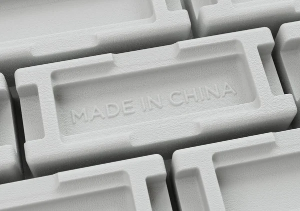 3Dは ポリスチレンボックスの背景のグループで 中国製 のサインを説明しました — ストック写真