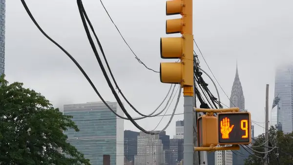 stock image New York City street crossroad, yellow traffic light, transport road intersection, United States. Chrysler Building. Queens, Long Island. Manhattan cityscape, NYC Midtown skyline, highrise skyscrapers