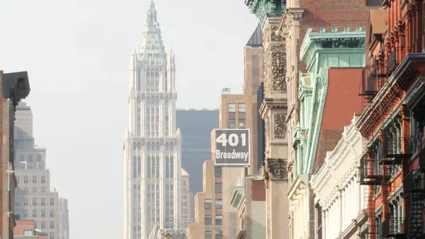 Stock image New York City Manhattan Soho fashion district, Broadway street. USA urban old classic american architecture. Shopping in NYC, United States. Business and residential real estate. Woolworth building.