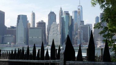 New York City Manhattan Downtown Financial District Skyline cityscape from Brooklyn Heights promenade, United States. Urban building architecture, FiDi World Trade Center high-rise skyscraper in USA. clipart