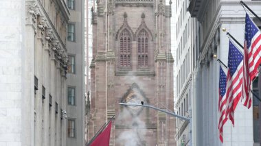 New York City United States. Lower Manhattan Downtown Financial District urban architecture. American Flag, Trinity Church. Wall street Stock Exchange building, USA Stock Market. Hot steam smoke stack clipart