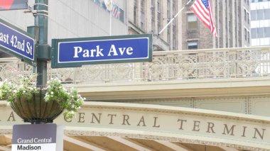 New York City Grand Central Terminal, 42 street, Park Avenue, Pershing Square bridge architecture. Midtown district railroad hub, railway transport. American flag, NY crossroad, intersection road sign clipart