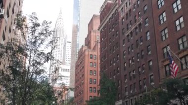 New York City Manhattan Midtown 42 sokak mimarisi. Chrysler binası, ikonik gökdelen, Lex Lexington Bulvarı, ABD. Amerikan kentsel konutları kırmızı tuğlalı ev, NYC kulesi, ABD.