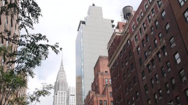 New York City Manhattan Midtown 42 street architecture. Chrysler building, iconic high-rise skyscraper, Lex Lexington avenue, USA. American urban residential red brick house, NYC tower, United States. clipart