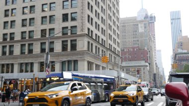 New York City, United States - 8 Sept 2023: Manhattan Midtown Broadway, 23 street, 5 avenue crossroad intersection. Worth Square near Madison Park and Flatiron Building, USA. People. Yellow taxi car clipart