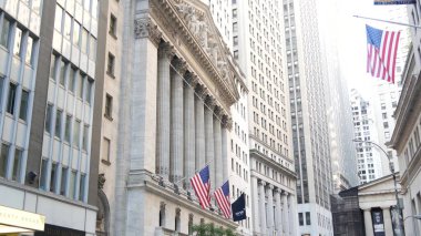 New York City, United States - 3 Sept 2023: Manhattan Downtown Financial District urban architecture. American flag. Wall street Stock Exchange building facade columns, USA Stock Market trading, NYC. clipart