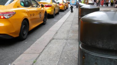 New York City, United States - 4 Sept 2023: Grand Central Terminal railway station, 42 street. Manhattan Midtown. Yellow taxi cab, cars on Pershing Square, USA. American urban road traffic and people. clipart