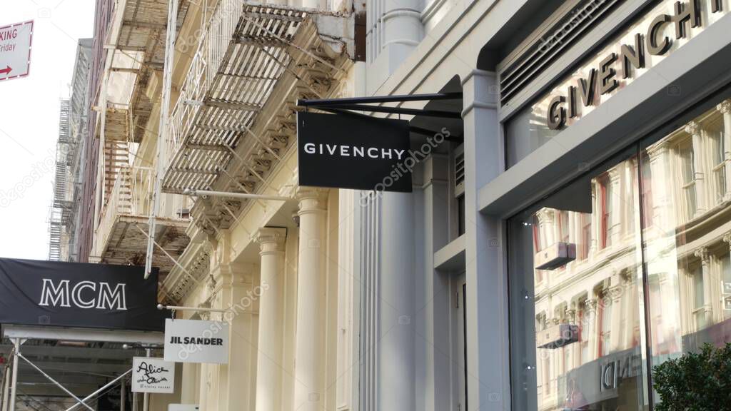 New York City, United States - 8 Sept 2023: Manhattan Soho fashion district near Broadway street, USA. Shopping boutique stores in NYC. Business and residential real estate. MCM, Givenchy brands logo.