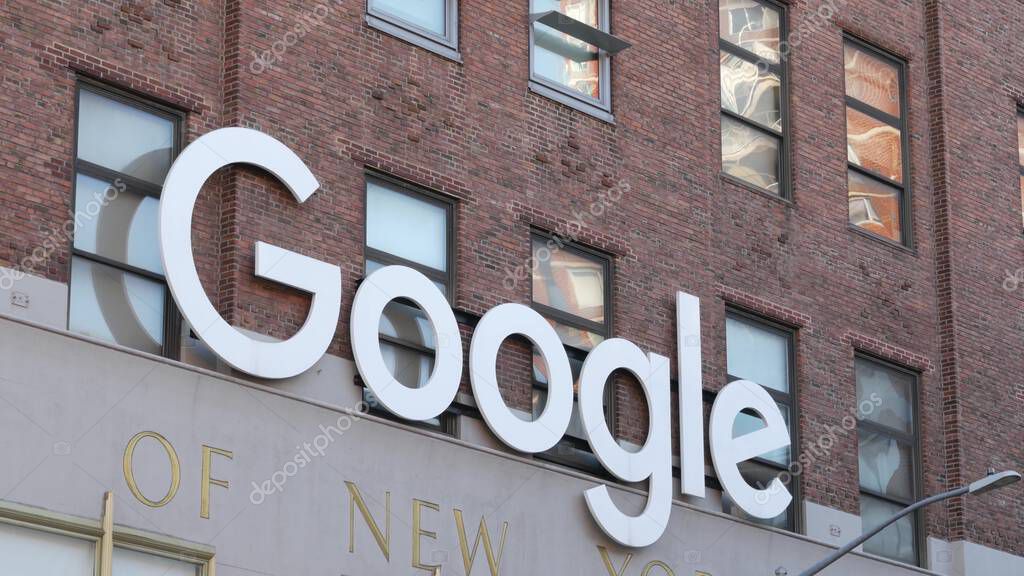 New York City, United States - 1 Sept 2023: Manhattan Midtown street or avenue. Urban red brick architecture USA. Google logo, logotype sign. NYC headquarters office near Chelsea Market and High Line.