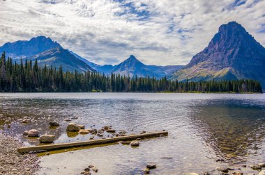 Two Medicine Lake and Sinopah Mountain at Glacier National Park in September clipart