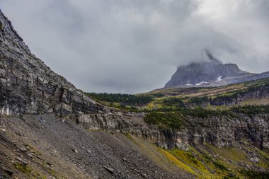 Beautiful mountainous scenery along the Going to the Sun Road at Glacier National Park, Montana in September clipart