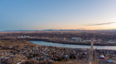 Aerial view of Great Falls, Montana at sunset in December clipart