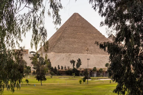 Great pyramid of Giza behind a golf course, Egypt