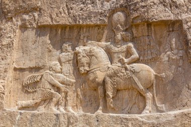 Triumph of Shapur I over the Roman emperors Valerian and Philip the Arab bas-relief in Naqsh-e Rostam, Iran