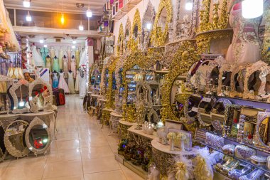 TABRIZ, IRAN - JULY 15, 2019: Dress and mirrors store at the Bazaar in Tabriz, Iran