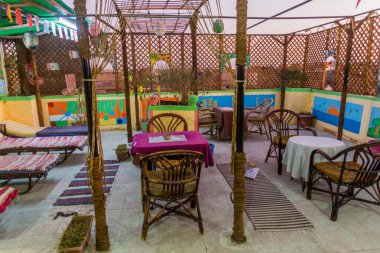 LUXOR, EGYPT - FEB 17, 2019: Rooftop terrace of Bob Marley Hotel Luxor, Egypt