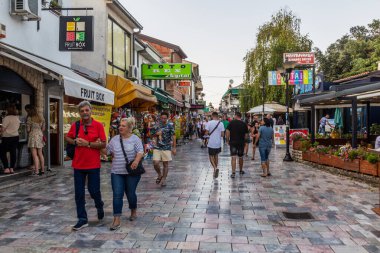 OHRID, NORTH MACEDONIA - AUGUST 7, 2019: Pedestrian street in the old town of Ohrid town, North Macedonia clipart