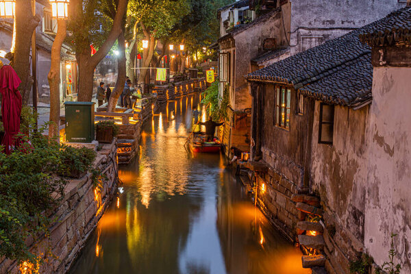 LUZHI, CHINA - OCTOBER 27, 2019: Evening view of a canal in Luzhi water town, Jiangsu province, China