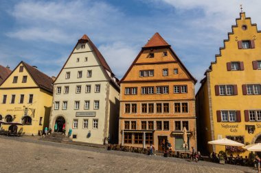ROTHENBURG, GERMANY - AUGUST 29, 2019: Houses at Marktplatz (Market Square) in Rothenburg ob der Tauber, Bavaria state, Germany
