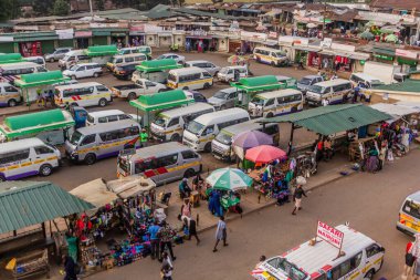 KAKAMEGA, KENYA - FEBRUARY 22, 2020: Aerial view of matatu (minibus) stand in Kakamega, Kenya clipart