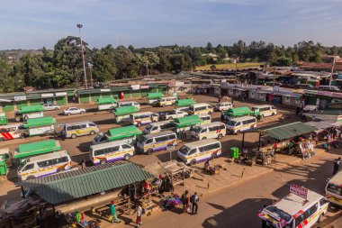 KAKAMEGA, KENYA - FEBRUARY 23, 2020: Aerial view of matatu (minibus) stand in Kakamega, Kenya clipart