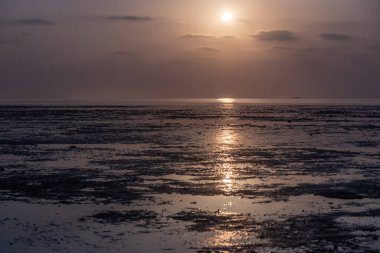 Moon shining over a coast of Farasan island, Saudi Arabia clipart
