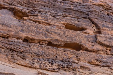 Jabal Ikmah rock inscriptions in Al Ula, Saudi Arabia clipart