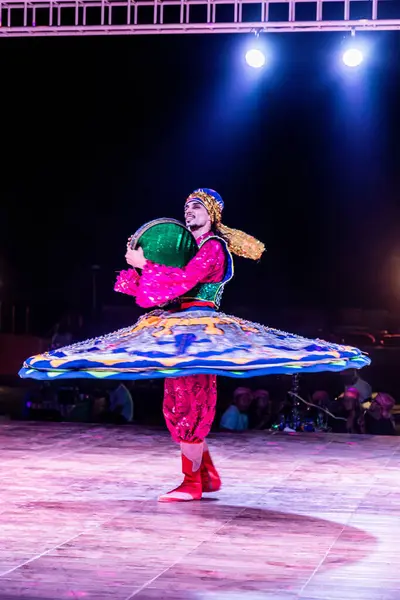 stock image UAE - OCTOBER 16, 2021: Dancer show in the desert of United Arab Emirates