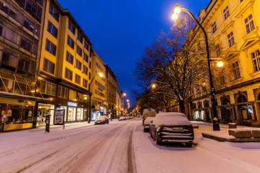 PRAGUE, CZECHIA - FEBRUARY 8, 2021: Morning winter view of Narodni Trida avenue in Prague, Czech Republic clipart