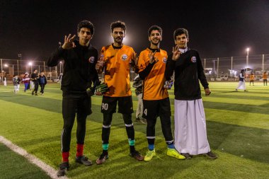 NAJRAN, SAUDI ARABIA - NOVEMBER 25, 2021: Soccer players in Najran, Saudi Arabia clipart