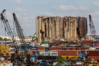 BEIRUT, LEBANON - AUGUST 1, 2022: View of Beirut port grain silos after their partial collapse on July 31, 2022. clipart