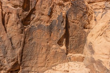 Rock art (petroglyphs) in Jubbah, Saudi Arabia clipart