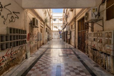 TABUK, SAUDI ARABIA - NOVEMBER 7, 2021: View of an alley in Tabuk, Saudi Arabia clipart