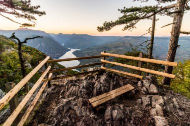 Sunset view of Drina river valley between Serbia and Bosnia and Herzegovina from Banjska Stena Viewpoint in Tara National Park clipart