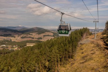 TORNIK, SERBIA - OCTOBER 6, 2021: Golden Gondola near  Tornik mountain, Serbia clipart