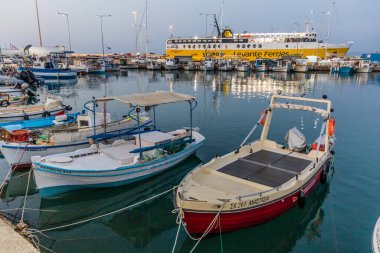 KILLINI, GREECE - AUGUST 9, 2021: Boats in the port of Killini on Peloponnese peninsula, Greece clipart