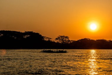 Sunset at Magdalena river, Colombia clipart