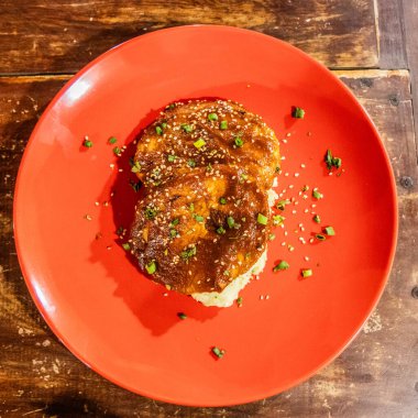 Steak with a corozo BBQ sauce, meal in Santa Cruz de Mompox, Colombia clipart