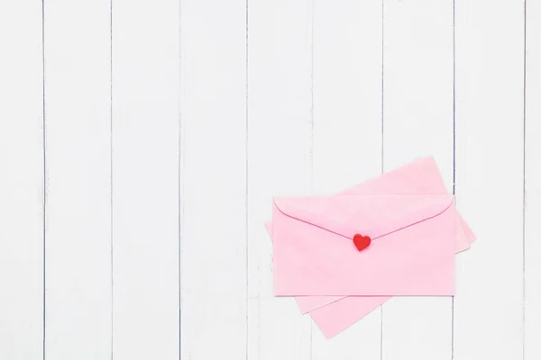 Flat Lay Pink Envelope Red Heart White Table Background Love — Stock Photo, Image