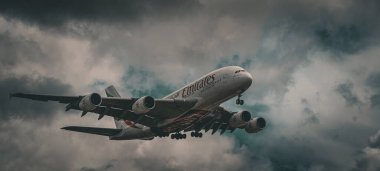 Emirates Airlines Airbus A380 approaching Heathrow Airport. London, United Kingdom, July 6, 2024. High quality photo clipart