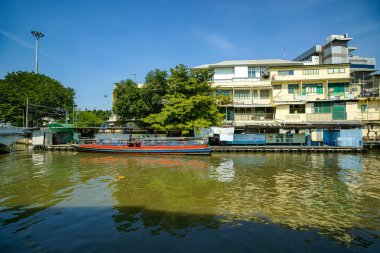 Bangkok, Thailand - January 19, 2025 : The atmosphere on both sides of the Saen Saep Canal, a canal where passenger boats take passengers into the center of Bangkok. clipart