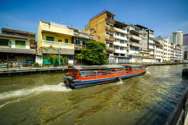 Bangkok, Thailand - January 19, 2025 : The atmosphere on both sides of the Saen Saep Canal, a canal where passenger boats take passengers into the center of Bangkok. clipart