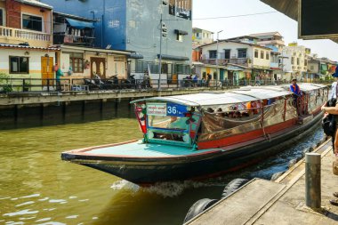 Bangkok, Thailand - January 19, 2025 : The atmosphere on both sides of the Saen Saep Canal, a canal where passenger boats take passengers into the center of Bangkok. clipart